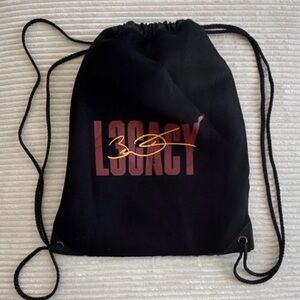 NBA Black Drawstring Backpack with Red and Gold Print